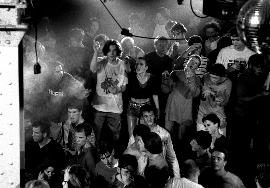 © Peter J Walsh / Museum of Youth Culture. Ravers on the main stage in the Hacienda, Manchester, 1989