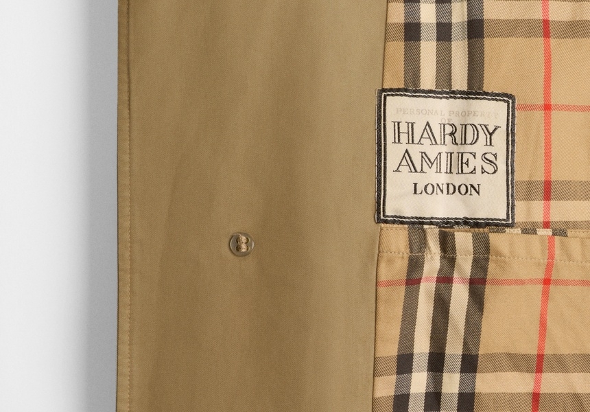 Detail of the personalised label in British fashion designer Hardy Amies’s Burberry car coat. 1979
